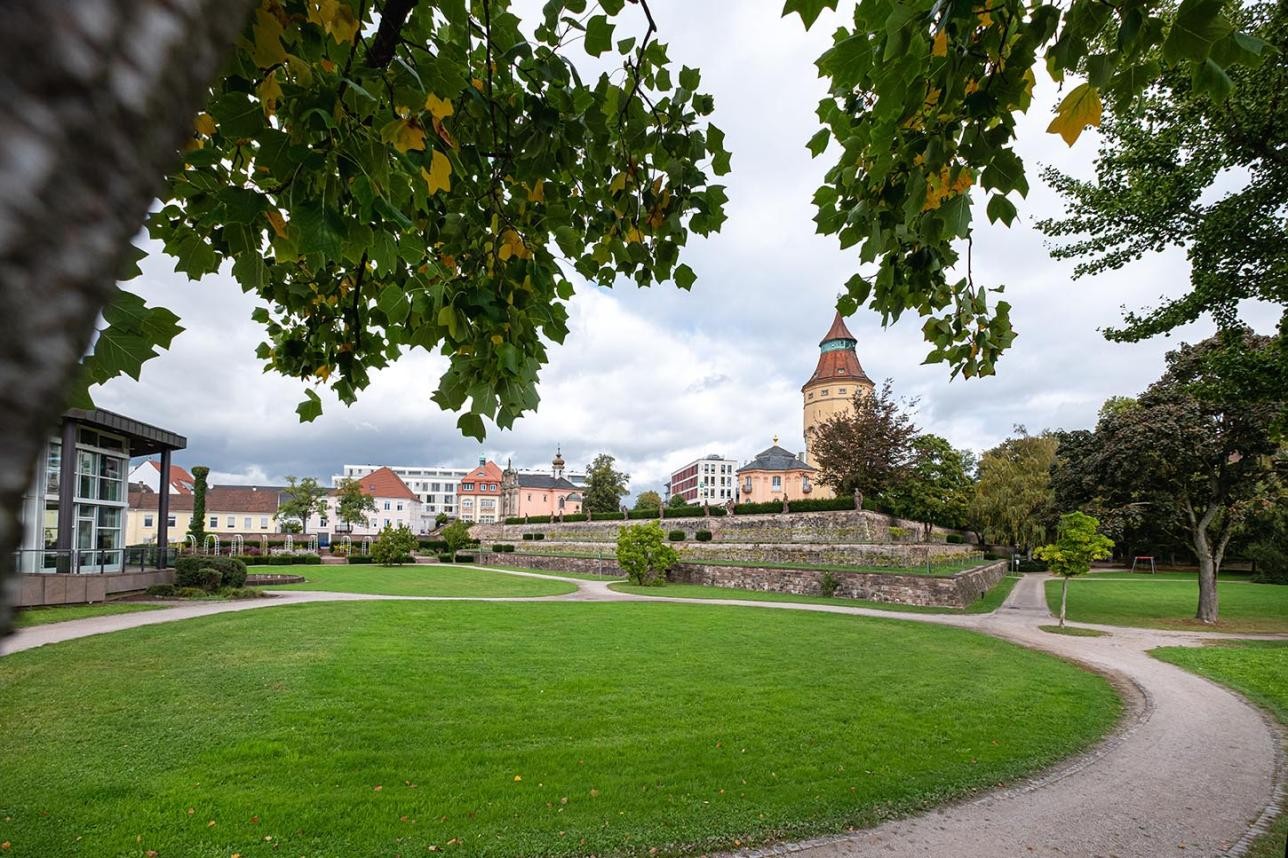 Green area Murgpark with a view of the Pagoda Castle